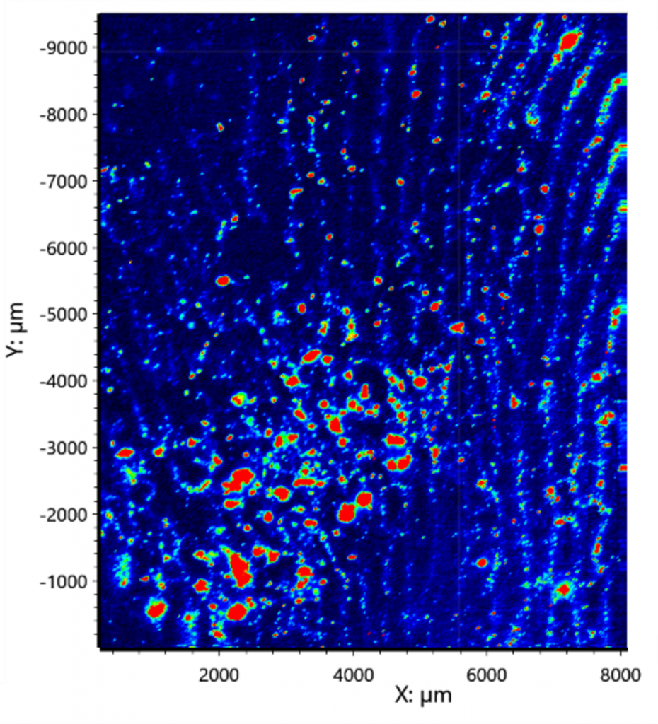 Raman map revealing trace amounts of paracetamol (shown in red) left behind in a fingerprint on aluminium foil.