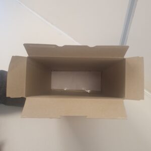 White paper taped to the bottom of the box to act as a projector screen for the Solar Eclipse Viewer