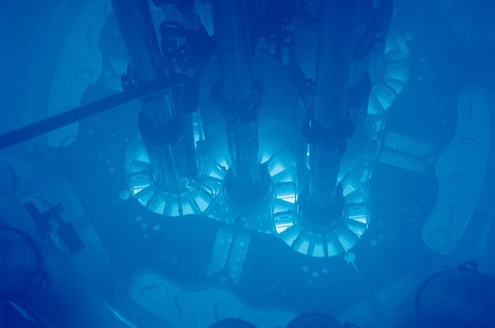 Emission of blue Cherenkov radiation from an underwater nuclear reactor at the Idaho National Laboratory. Credit: Argonne National Lab, reproduced under CC-2.0 licence.