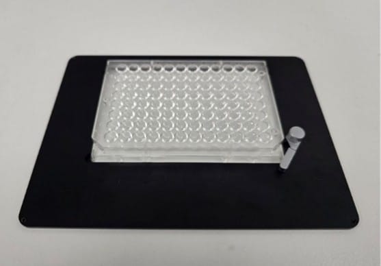 Multi-well plate stage insert for Edinburgh Instruments Raman microscope