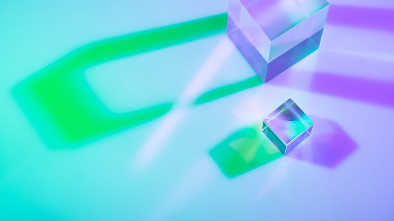 Optical glass crystal prism. Multicolor holographic light effect